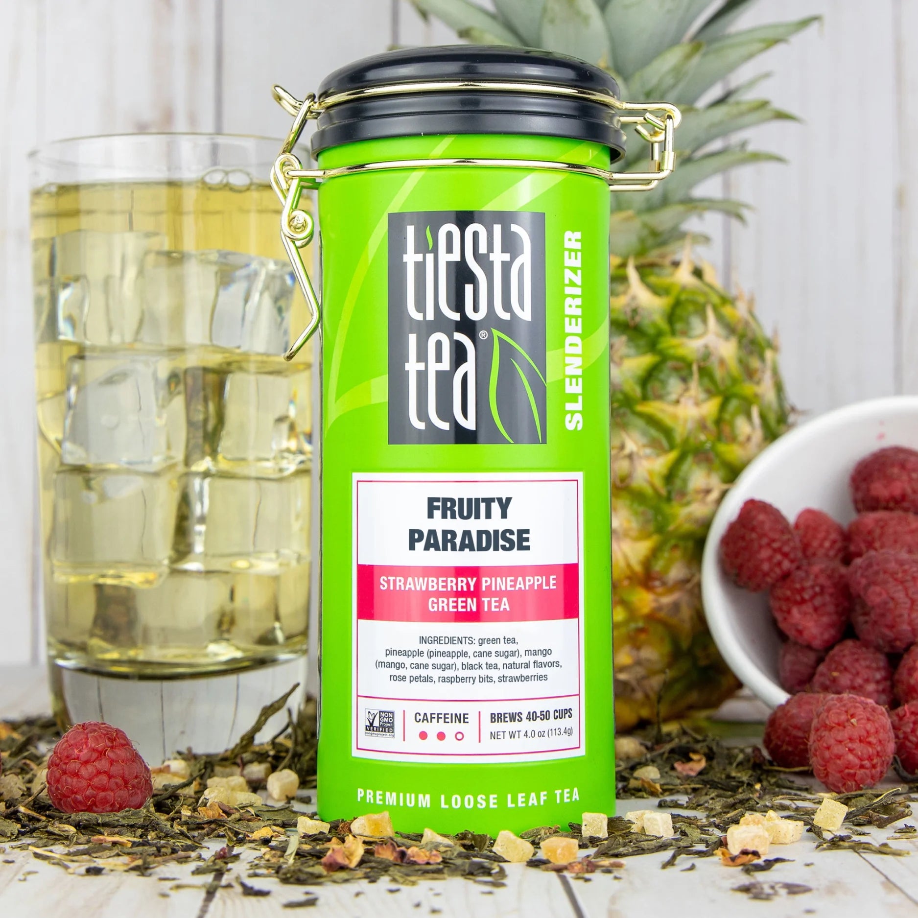 - Fruity Paradise, Slenderizer Loose Leaf Green Tea, Strawberry Pineapple Green Tea, Medium Caffeine, Gmo-Free, Make Hot or Iced Tea & Brews up to 50 Cups - 4 Ounce Refillable Tin